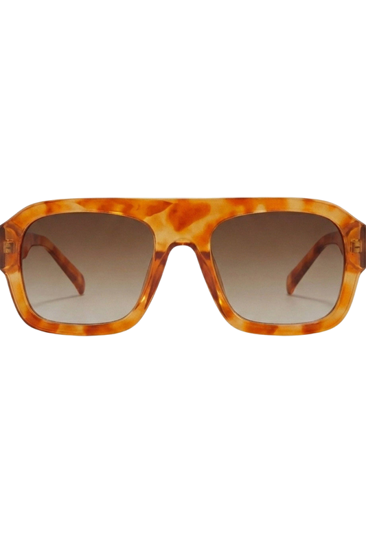 Sunglasses with tortoiseshell frame and brown gradient lenses on a white background